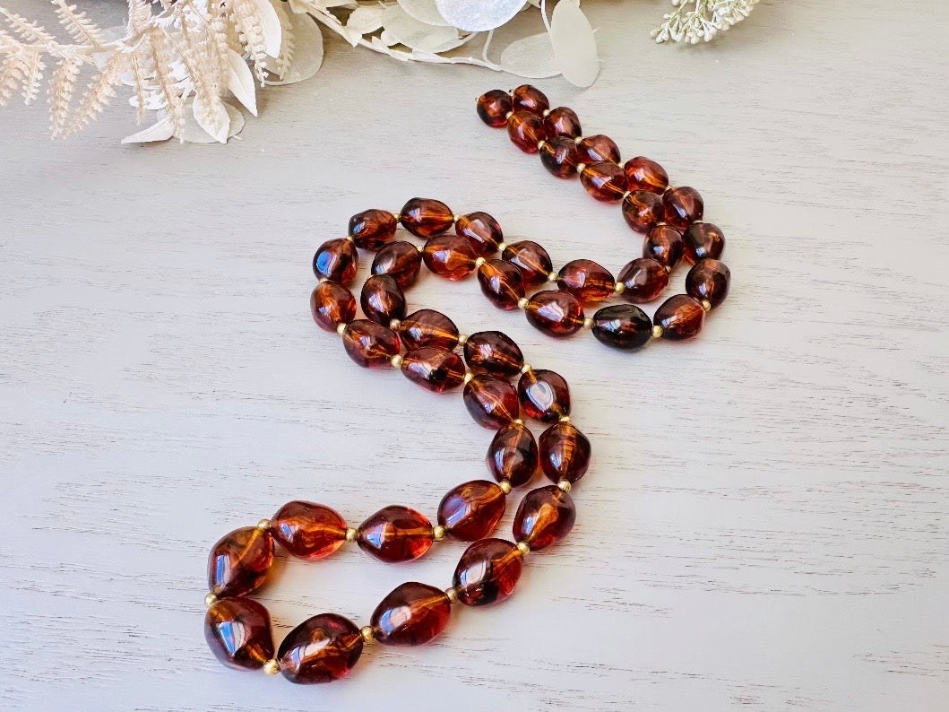 Vintage Faux Amber Necklace, Long Beaded Glowing Rootbeer Simulated Amber Trifari Necklace with Gold Accents, 1970s Signed Designer Jewelry