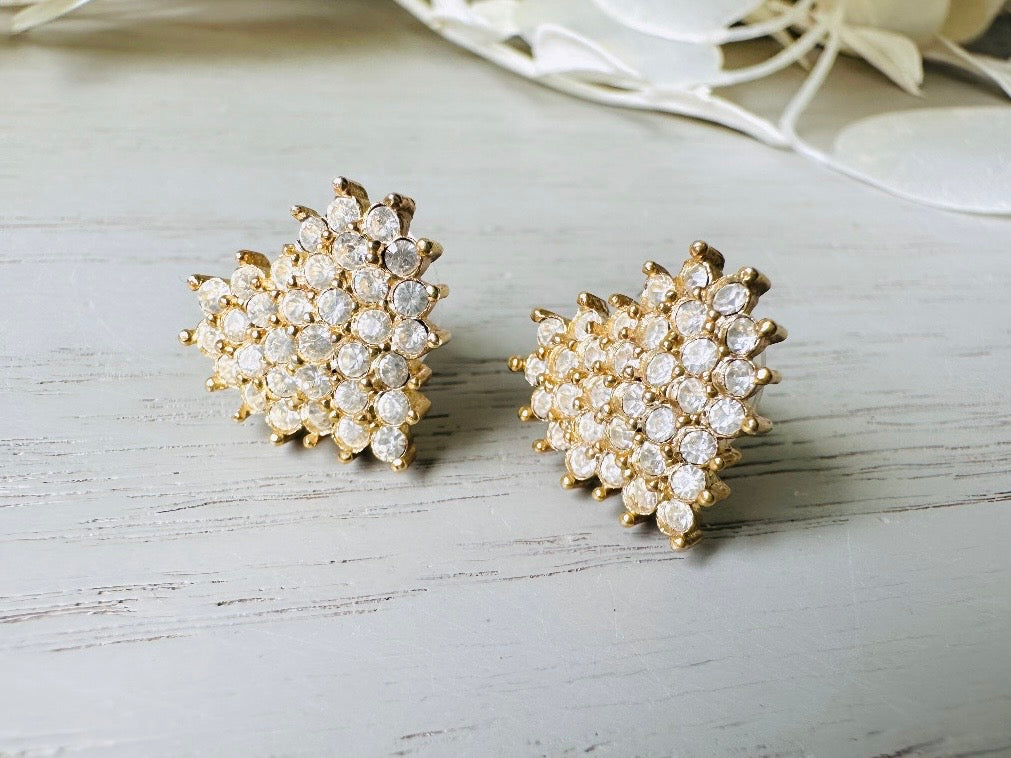 These crystal heart earrings are a stunning pair of vintage Roman Designer pave diamond rhinestone earrings. These pierced post heart stud earrings have an understated elegance, perfect for cocktail hour, or a bridal look. These are post/stud style for pierced ears, from the 1990s.