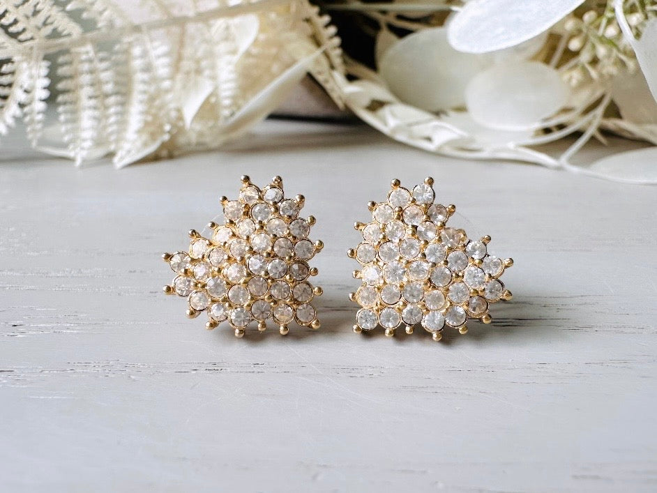 These crystal heart earrings are a stunning pair of vintage Roman Designer pave diamond rhinestone earrings. These pierced post heart stud earrings have an understated elegance, perfect for cocktail hour, or a bridal look. These are post/stud style for pierced ears, from the 1990s.