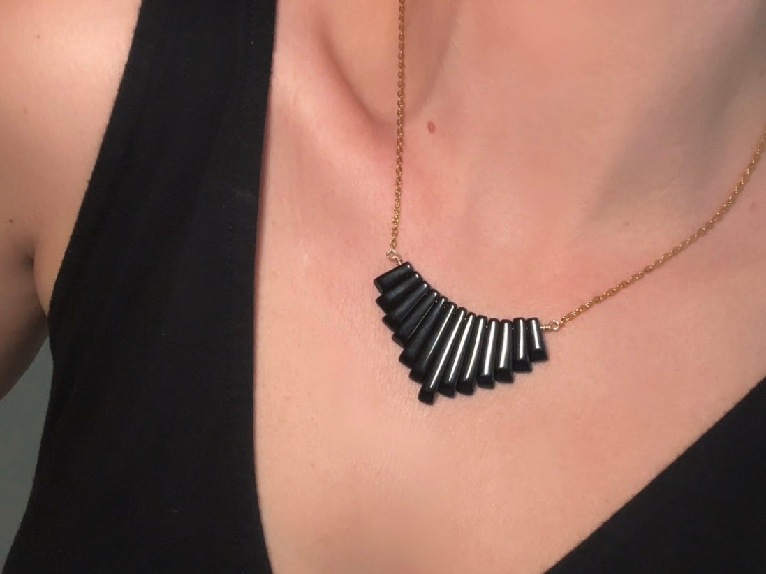 Handmade Black Onyx Graduated Fan Necklace, 18Kt Gold + Onyx Gemstone modelled by Bethan Jayne