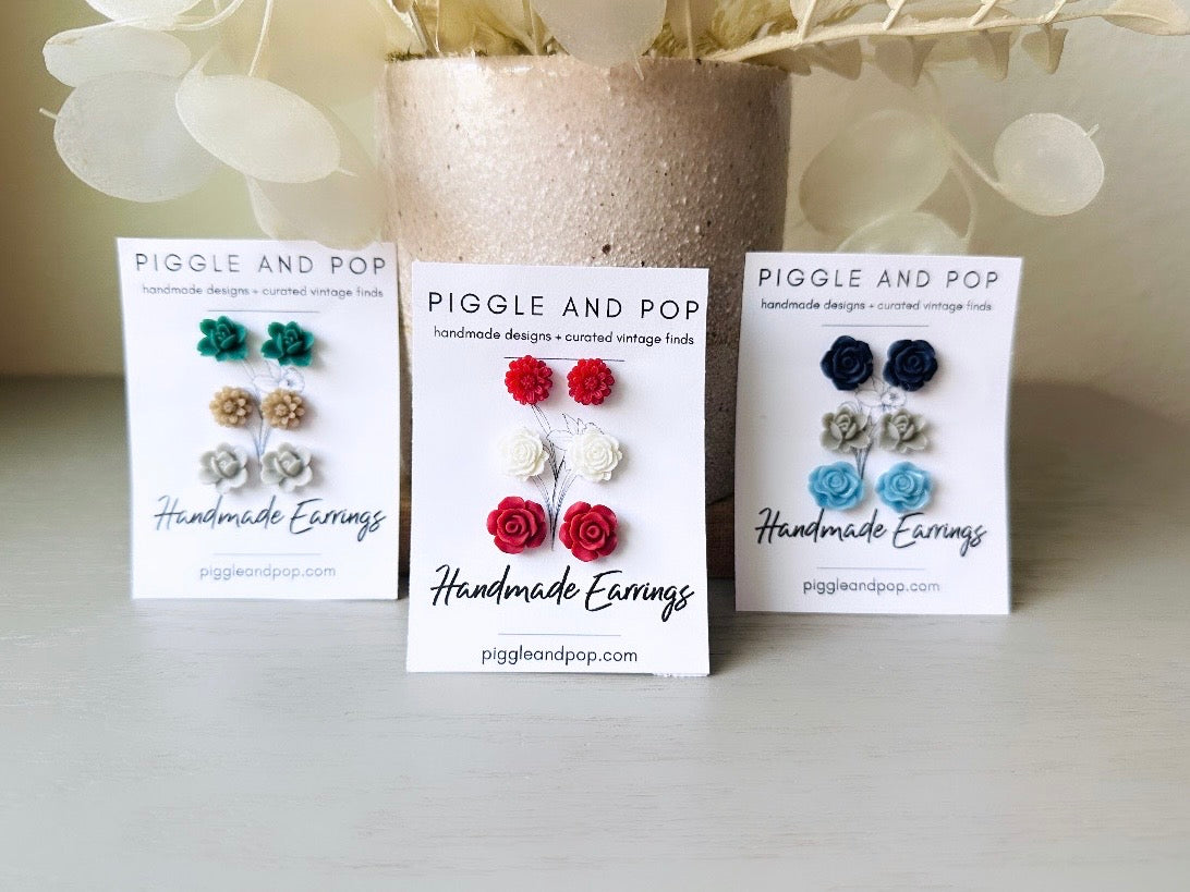 This flower earring set is full of the prettiest colors! Minty green bloomed roses, cream peonies and deep dusty rose lilies- a wonderful set of everyday earrings. These handmade resin flower earrings have hypoallergenic surgical steel posts with butterfly backs making them great for sensitive ears + comfortable all day wear.