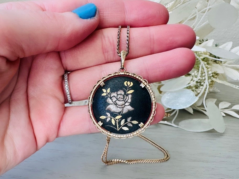1940s Vintage Rose Necklace, Krementz Black Floral Pendant Necklace in hand