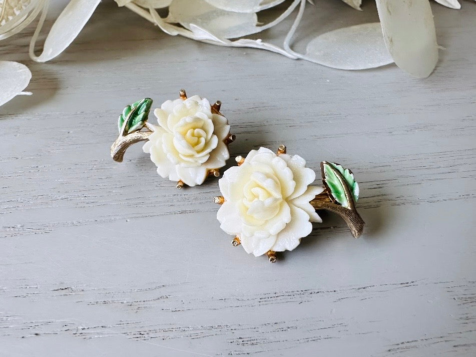 1950s Rose Earrings, Cream Celluloid Flower Earrings with Green and Gold Leaf Accents, Classic Floral Vintage Clip On Earrings from Piggle and Pop 1