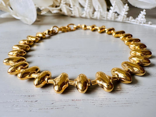 1970s Gold Signed Monet Vintage Designer Sawtooth Bracelet close up