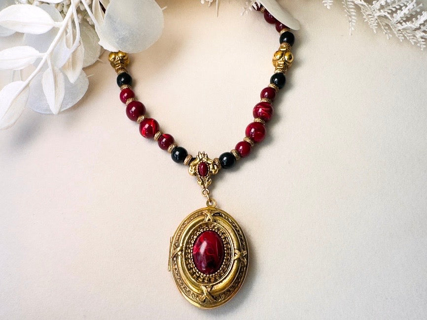 Vintage 1928 Jewelry Co. Ornate Gold-Tone & Marbled Red Cabochon Locket Statement Necklace