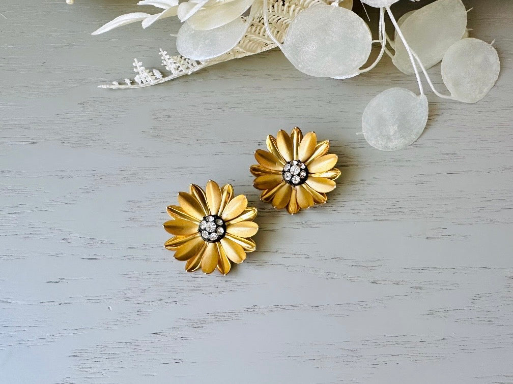 Gold Flower Earrings, Romantic Vintage 1960s Clip On Earrings, Matte Gold Tone Daisy Flower Rhinestone Center 1-3/8" 3D Layered Metal Petal