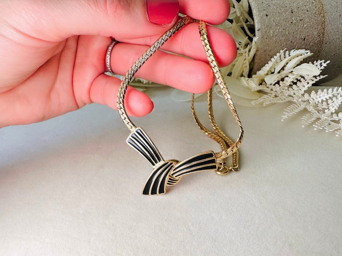 Vintage Trifari Bow Necklace, Black and Gold Ribbon Pendant Necklace on Gold Herringbone Chain