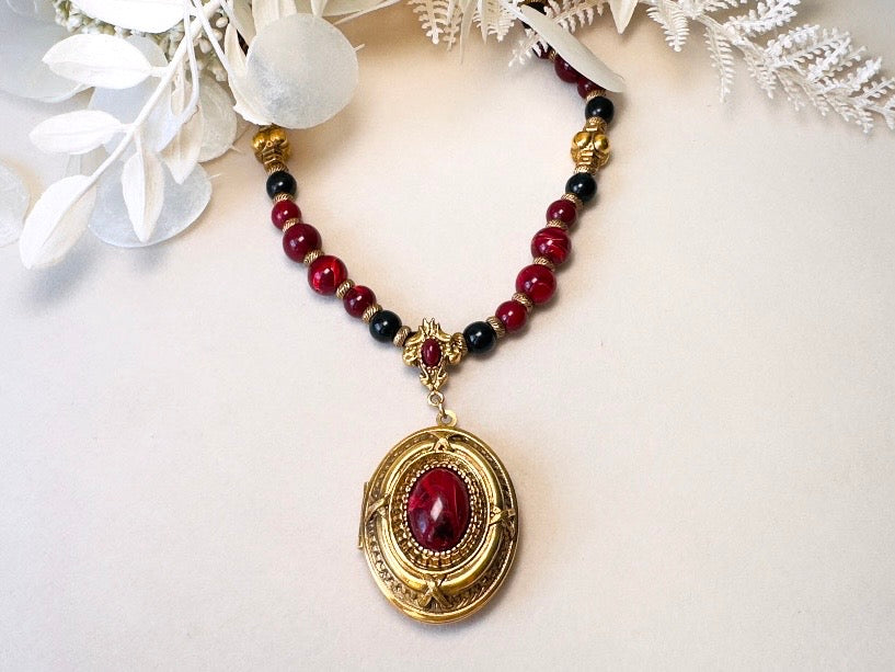 Vintage 1928 Jewelry Co. Ornate Gold-Tone & Marbled Red Cabochon Locket Statement Necklace