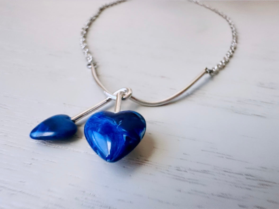 Blue and Silver Double Heart Necklace, Sleek Vintage 1976 Sarah Coventry Duo Heart Necklace, Twisted Heart Necklace with Blue Stones