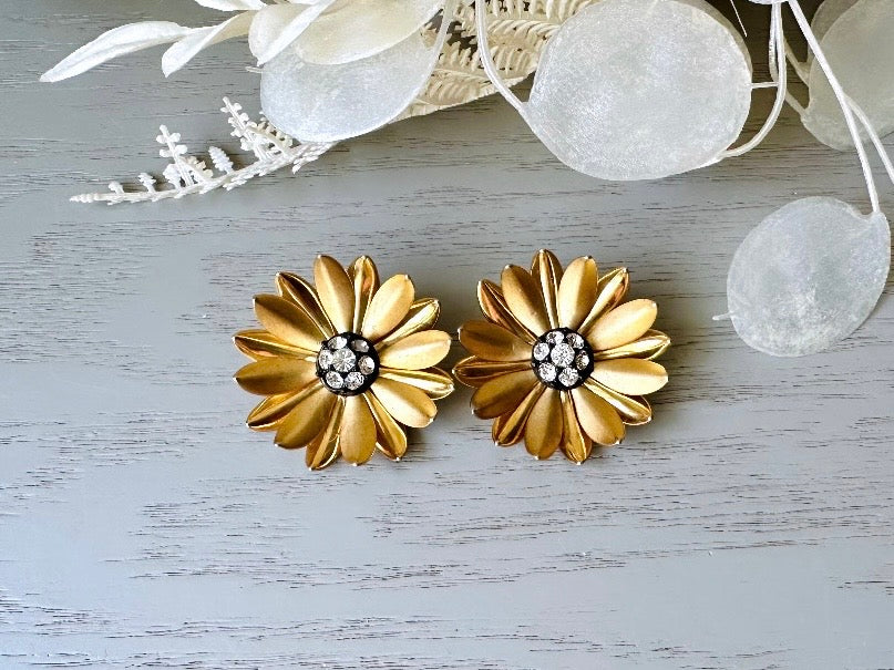 Gold Flower Earrings, Romantic Vintage 1960s Clip On Earrings, Matte Gold Tone Daisy Flower Rhinestone Center 1-3/8" 3D Layered Metal Petal