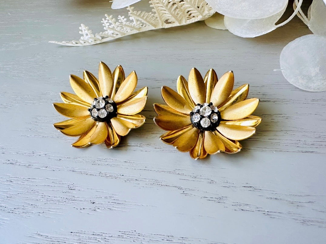 Gold Flower Earrings, Romantic Vintage 1960s Clip On Earrings, Matte Gold Tone Daisy Flower Rhinestone Center 1-3/8" 3D Layered Metal Petal