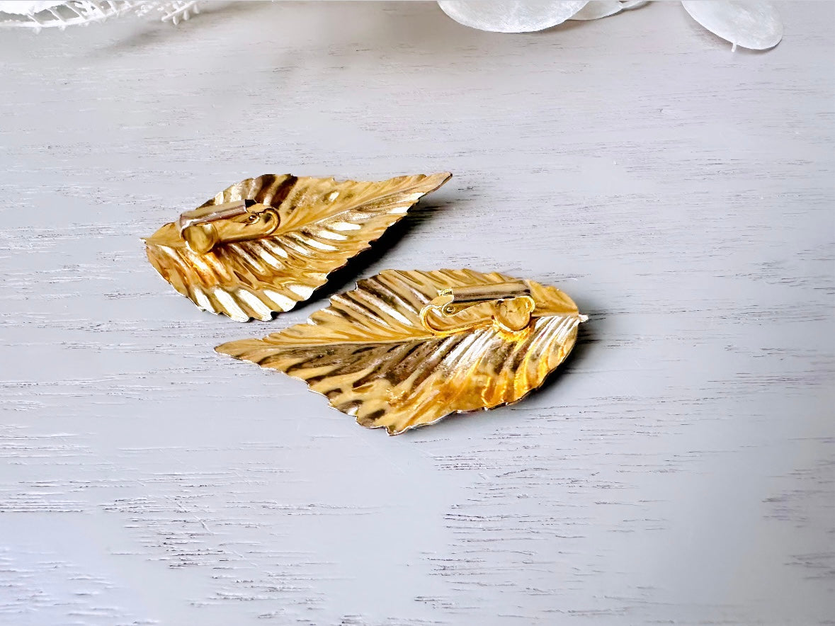 Vintage Gold Leaf Earrings with Black Enamel Tips, Gold Leaves Clip On Earrings, 1980s Statement Earring, Whimsical Clip-Ons for Non-Pierced from Piggle and Pop