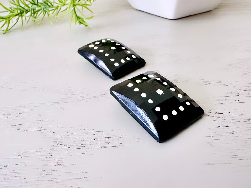 Black Domino Earrings, Vintage West Germany Faceted Black Rectangle Clip Ons with White Polka Dots  close up side view