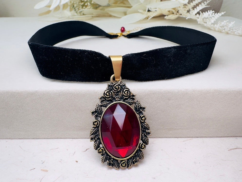 Black Velvet Choker Necklace with Red Bezel Set Crystal, Antique Gold Floral Pendant, Victorian Ribbon Choker with Glowing Faceted Cabochon