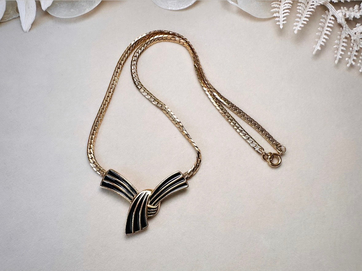 Vintage Trifari Bow Necklace, Black and Gold Ribbon Pendant Necklace on Gold Herringbone Chain
