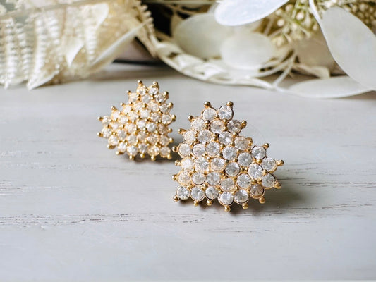 These crystal heart earrings are a stunning pair of vintage Roman Designer pave diamond rhinestone earrings. These pierced post heart stud earrings have an understated elegance, perfect for cocktail hour, or a bridal look. These are post/stud style for pierced ears, from the 1990s. 