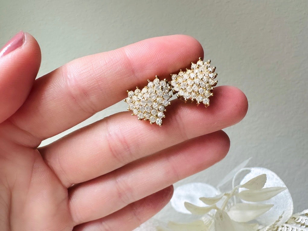 These crystal heart earrings are a stunning pair of vintage Roman Designer pave diamond rhinestone earrings. These pierced post heart stud earrings have an understated elegance, perfect for cocktail hour, or a bridal look. These are post/stud style for pierced ears, from the 1990s. 