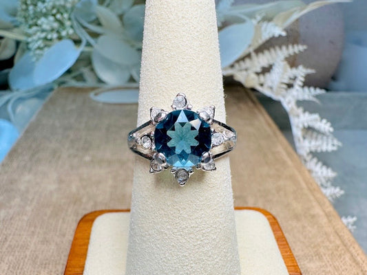 Vintage London Blue Cocktail Ring with Diamond Rhinestone Border, Faceted Round Montana Blue Stone, Silver 14K Electroplated Ring Size 7.25