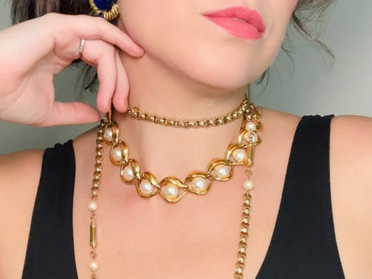 Gold Napier Infinity Necklace with Oversized Woven Pearls modelled by bethan jayne 