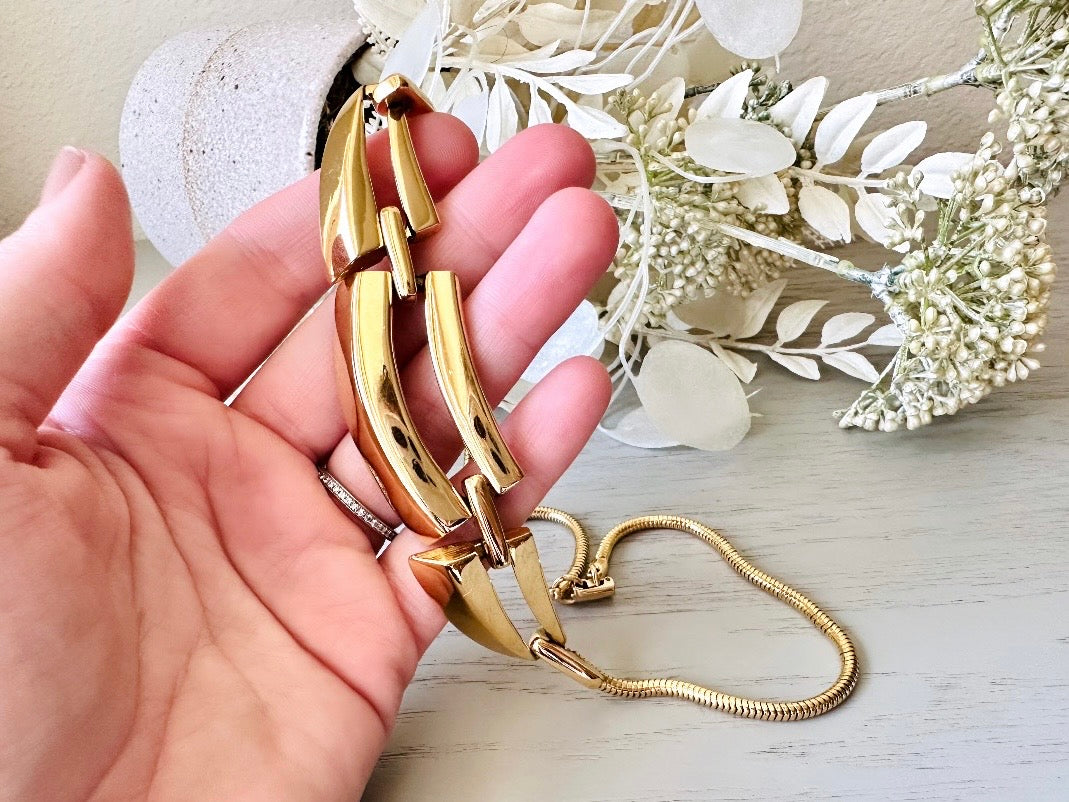Gold Napier Necklace, Geometric Articulated Panel Collar Necklace in hand