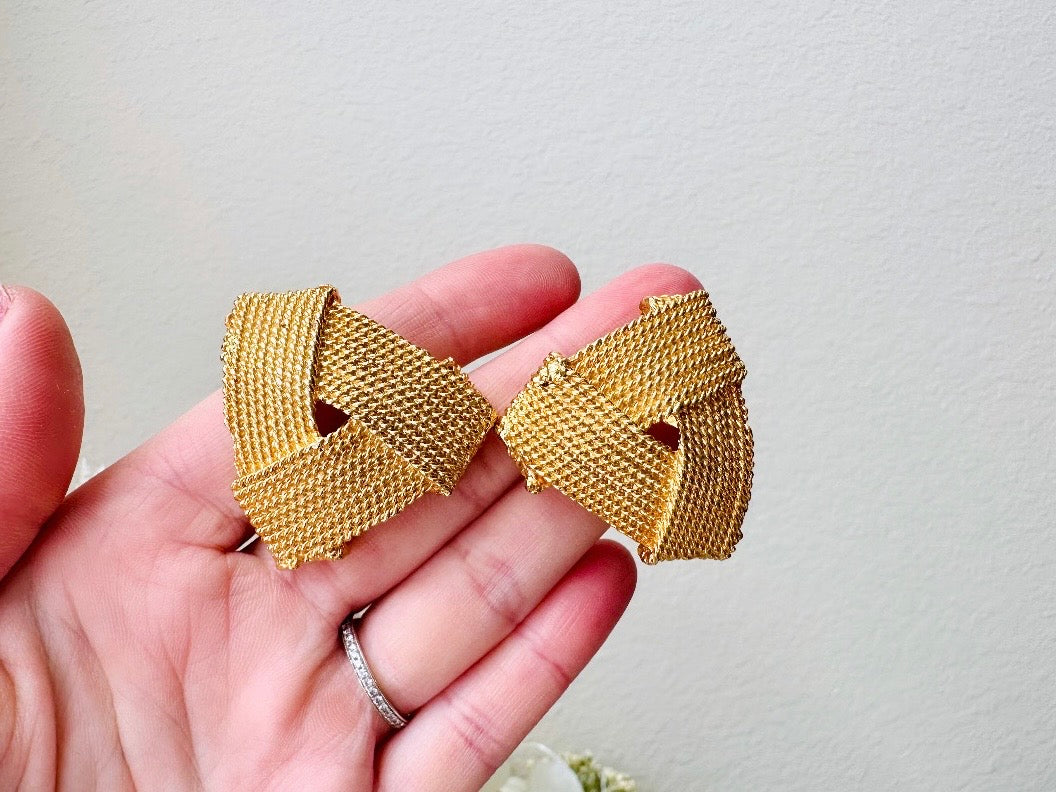 Gold Rope Triangle Earrings, Oversized 1980s Runway Earrings, Mega Glam Clip Ons in hand