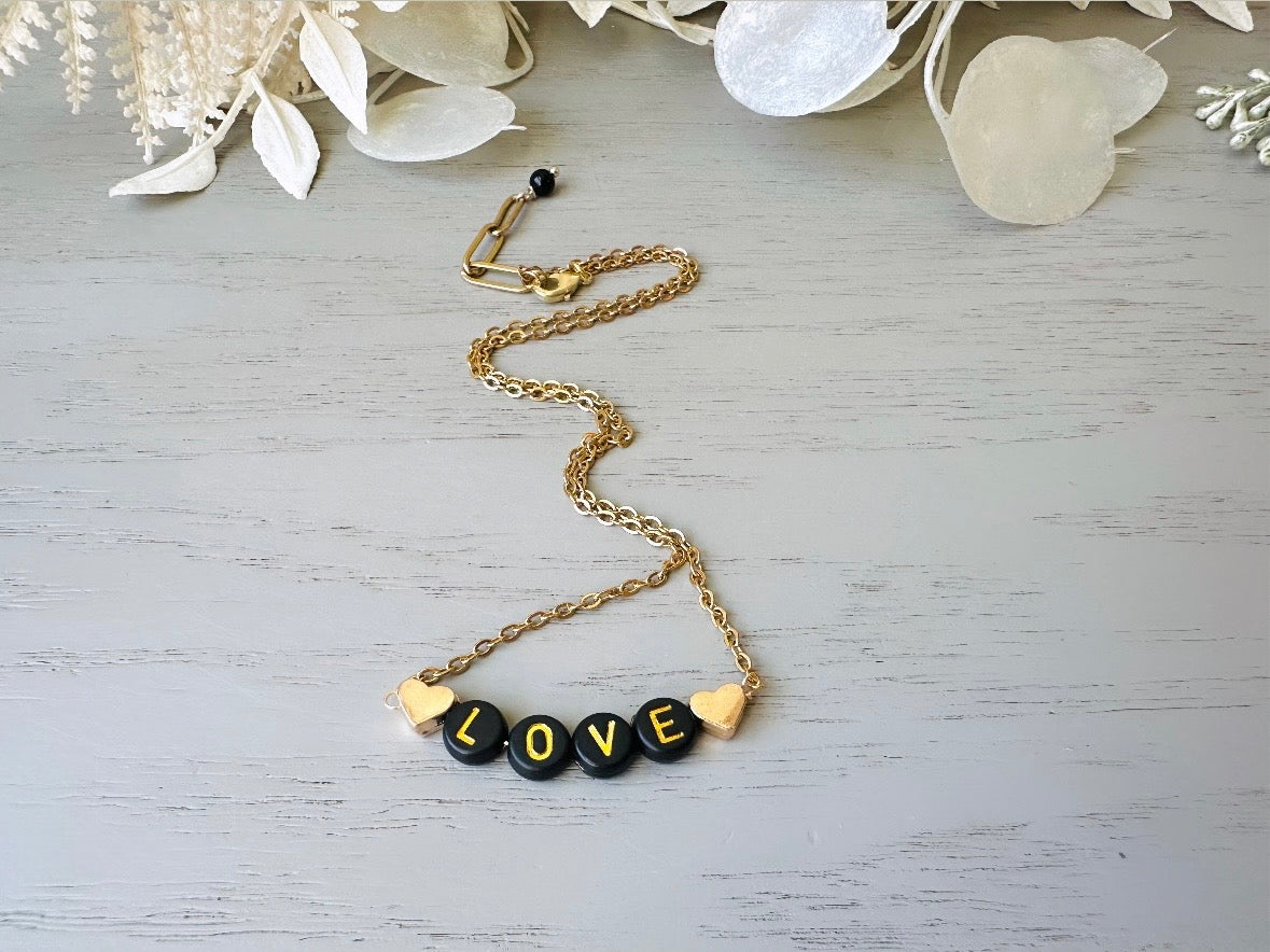 Handmade Love Beaded Necklace, 18k Chain Black and Gold Heart  top view