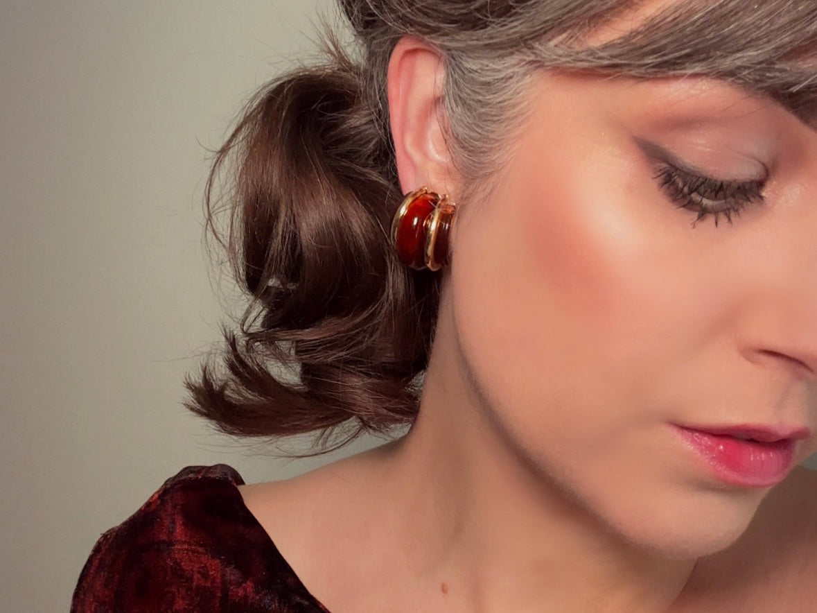 Bethan Jayne modelling vintage Kenneth Jay Lane amber clip on earrings
