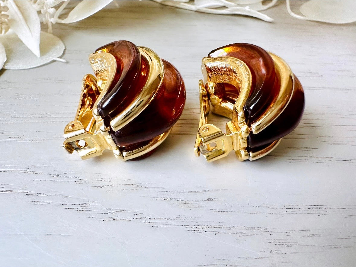 side view of glowing amber clip on earrings  by KJL
