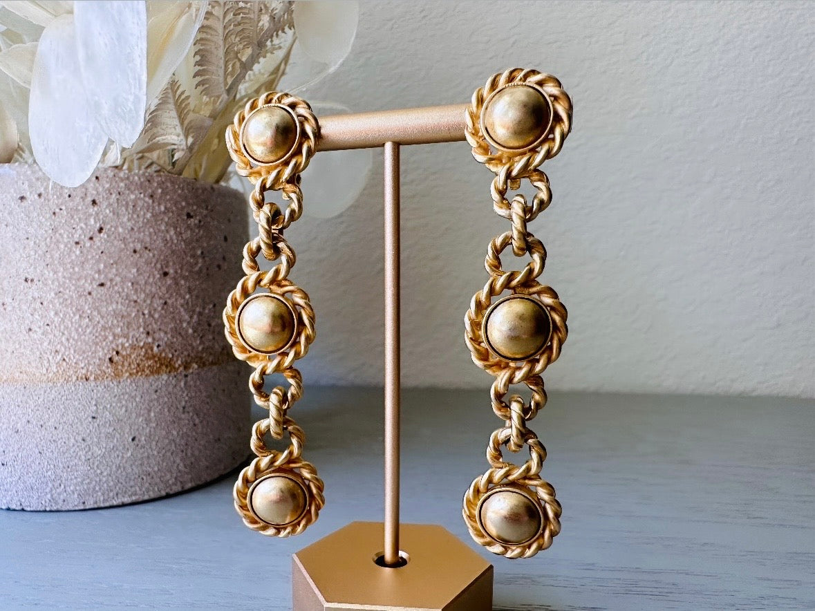 Matte Gold Drop Chain Earrings, Erwin Pearl Vintage Clip On Earrings, 1980s Dramatic Gold Earrings, Triple Link Chain Rope Border Earrings from Piggle and pop