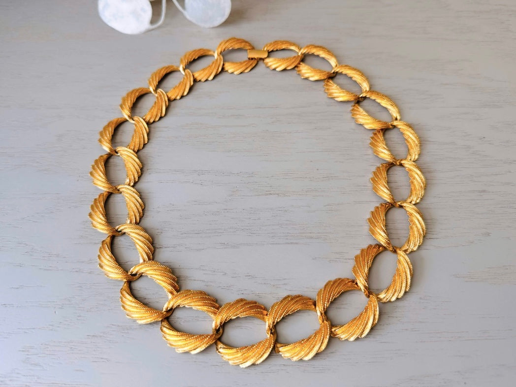 Napier Brushed Gold Textured Chain Necklace, Burnished Gold Designer Necklace close up 
