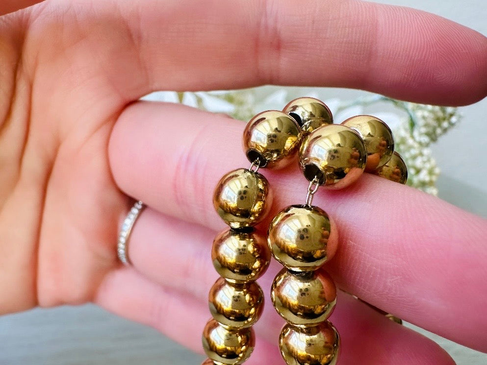close up of chain components on Napier Shiny Gold Ball Chain Choker Vintage Designer Necklace