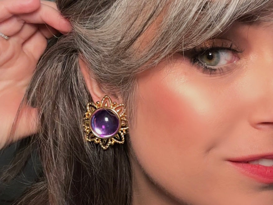 Purple Trifari Jelly Belly Sun Earrings, Rare Moonglow Violet Domed Glass Earrings modelled by bethan jayne 