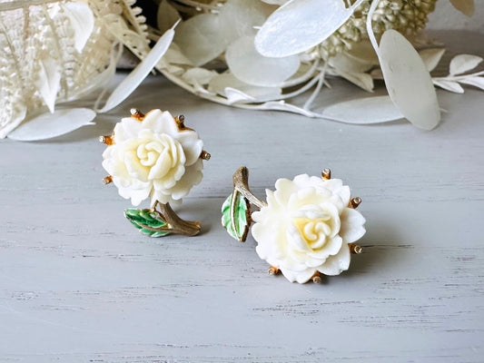 1950s Rose Earrings, Cream Celluloid Flower Earrings with Green and Gold Leaf Accents, Classic Floral Vintage Clip On Earrings