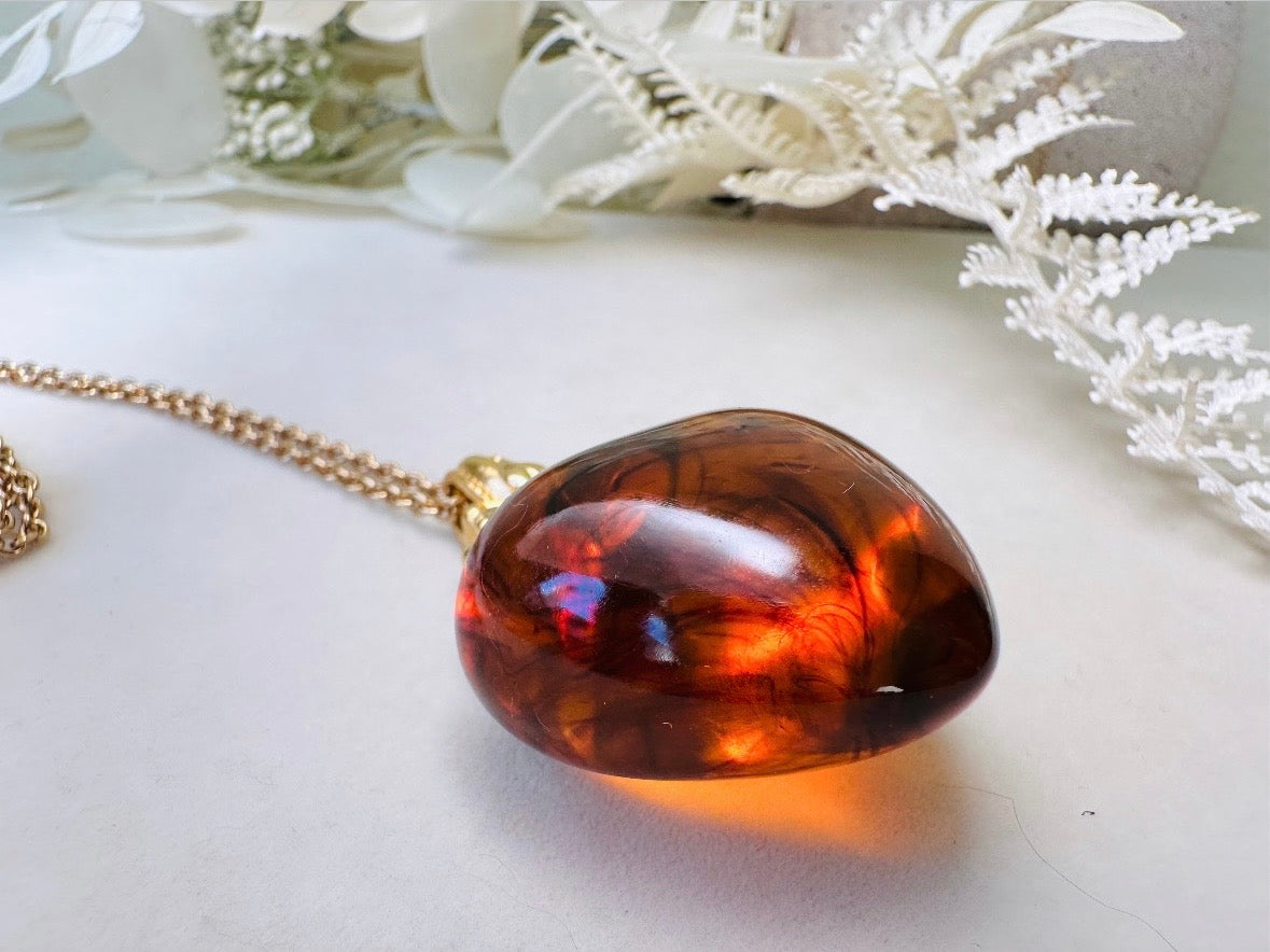 Vintage Amber Heart Necklace, Long Gold Chain Necklace with Glowing Tortoiseshell Lucite Puffy Heart Pendant with Regal Scrolled Accents