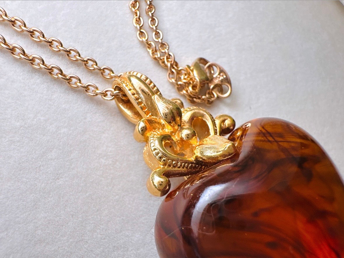 Vintage Amber Heart Necklace, Long Gold Chain Necklace with Glowing Tortoiseshell Lucite Puffy Heart Pendant with Regal Scrolled Accents