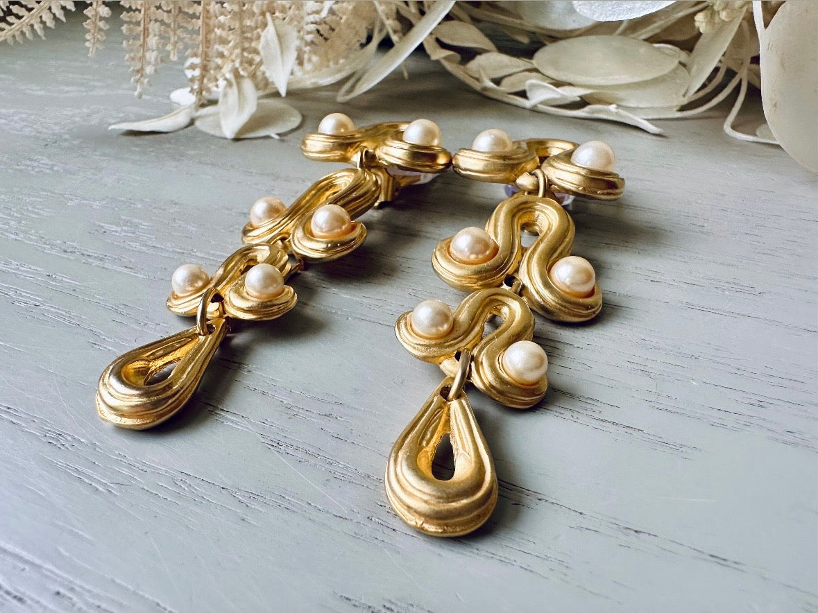 close up vintage Blanca Designer Pearl Drop Oversized Matte Gold Clip On Earrings Modelled by Bethan Jayne from Piggle and Pop 