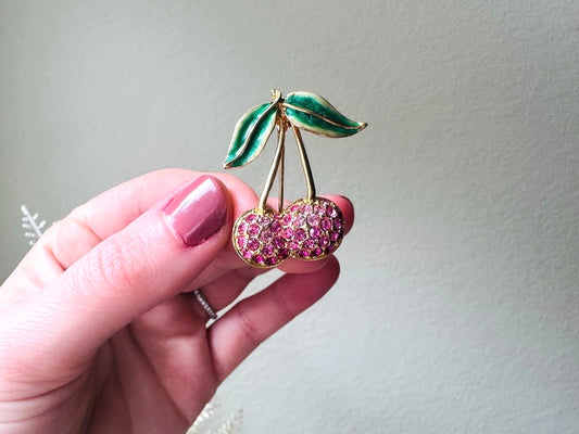 Vintage Cherry Brooch, Sparkling Pink Rhinestone Cherry Pin from Piggle and Pop held in hand