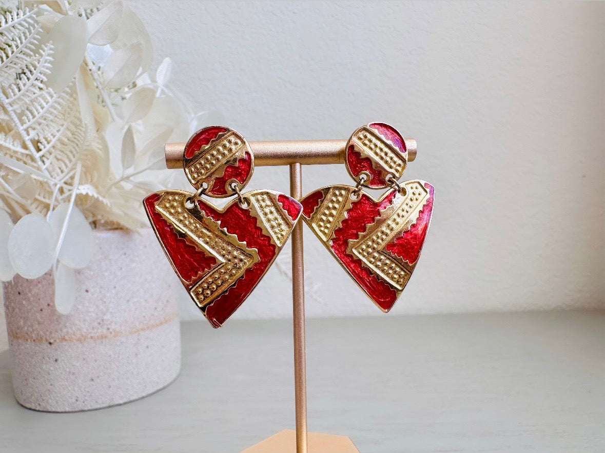 Vintage Geometric Earrings, 1980s Red and Gold Enamel Triangle Pierced Post Earring from Piggle and Pop on display in natural light