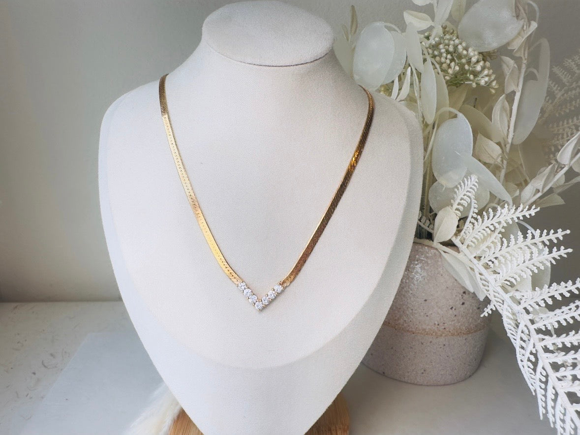 Vintage Gold Herringbone Chain Necklace with Rhinestone Chevron Bar Pendant
