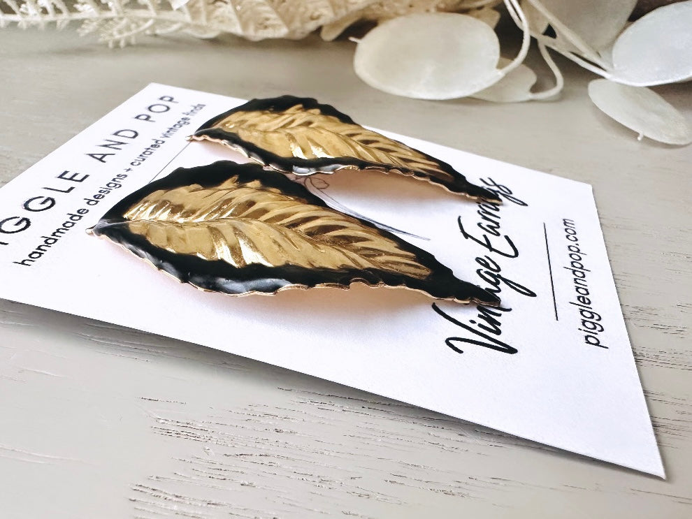 Vintage Gold Leaf Earrings with Black Enamel Tips, Gold Leaves Clip On Earrings, 1980s Statement Earring, Whimsical Clip-Ons for Non-Pierced from Piggle and Pop