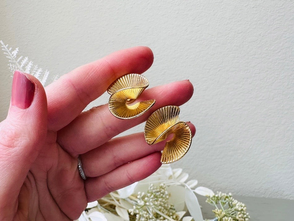 Vintage Gold Spiral Earrings, 80s Gold Helix Sculptural Pierced Earrings held in hand