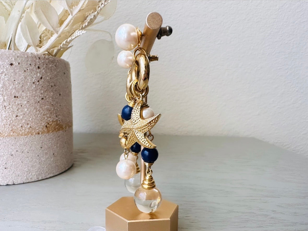 Vintage Starfish Earrings, Cascading Charm Earrings with Pools of Light Quartz Orbs, Navy and Cream Pearls side view