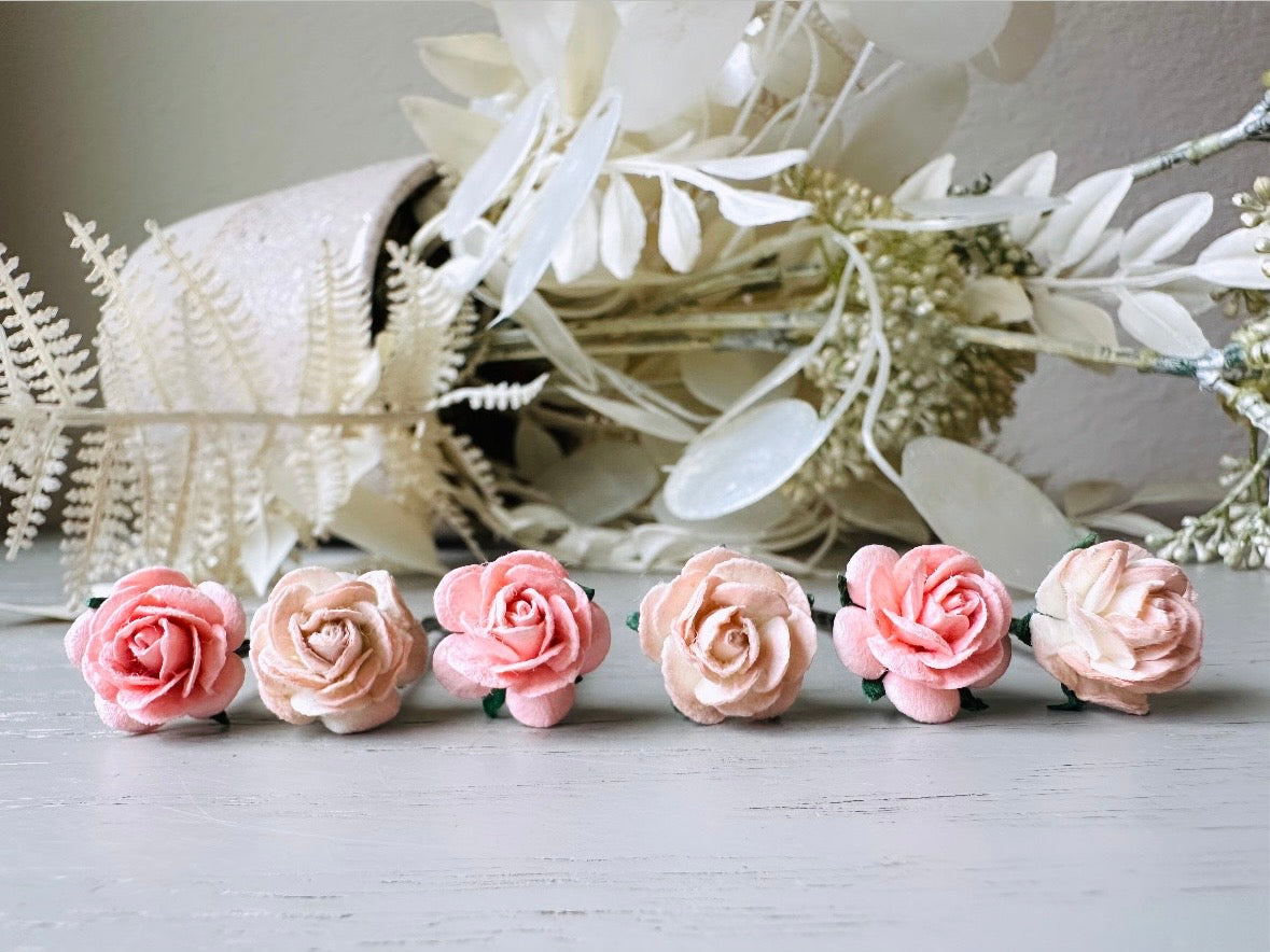 These sweet pink two tone rose paper flower hair pins will add a touch of rustic whimsy to your favorite hair styles. This handmade set includes 6 miniature mulberry paper roses in a light peachy pink and cotton candy pink wire wrapped around salon quality "no slip" bobby pins, three of each color. These pins are ideal for your wedding, celebrations, and any day you feel like making a little special. 