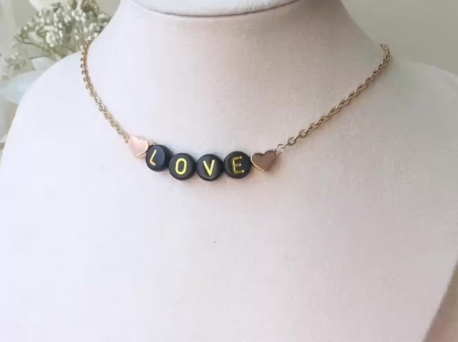 Handmade Love Beaded Necklace, 18k Chain Black and Gold Heart from Piggle and Pop video