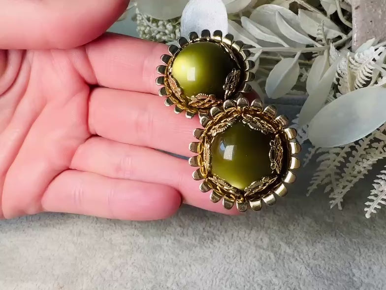 Green Moonglow Earrings, Vintage 1950s Caroline Emmons Avocado Green Lucite Earrings with Gold Lace Open Work Bezel video