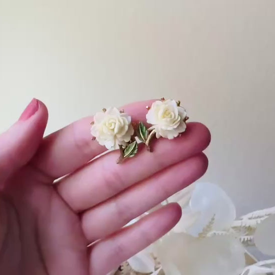 1950s Rose Earrings, Cream Celluloid Flower Earrings with Green and Gold Leaf Accents from Piggle and Pop video