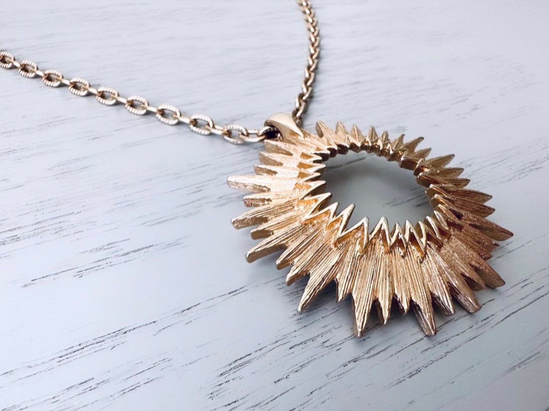 Sarah Coventry Outer Space Necklace in Gold from Piggle and Pop