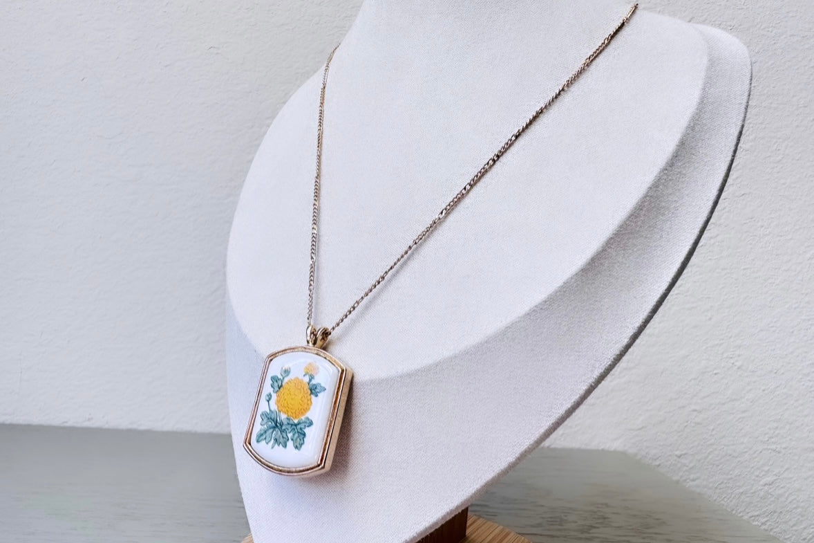 White Porcelain Pendant with Yellow Chrsanthemums 1980 Floral Heritage Vintage Avon Necklace