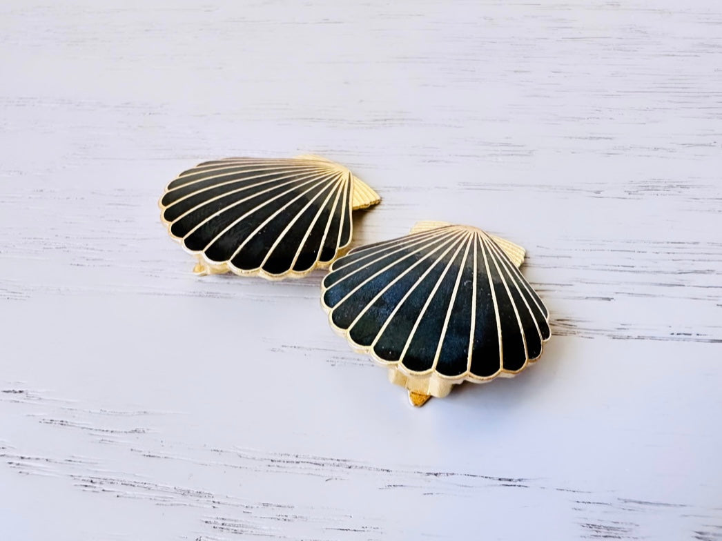 Vintage black and gold enamel clip on shell earrings from Piggle and Pop