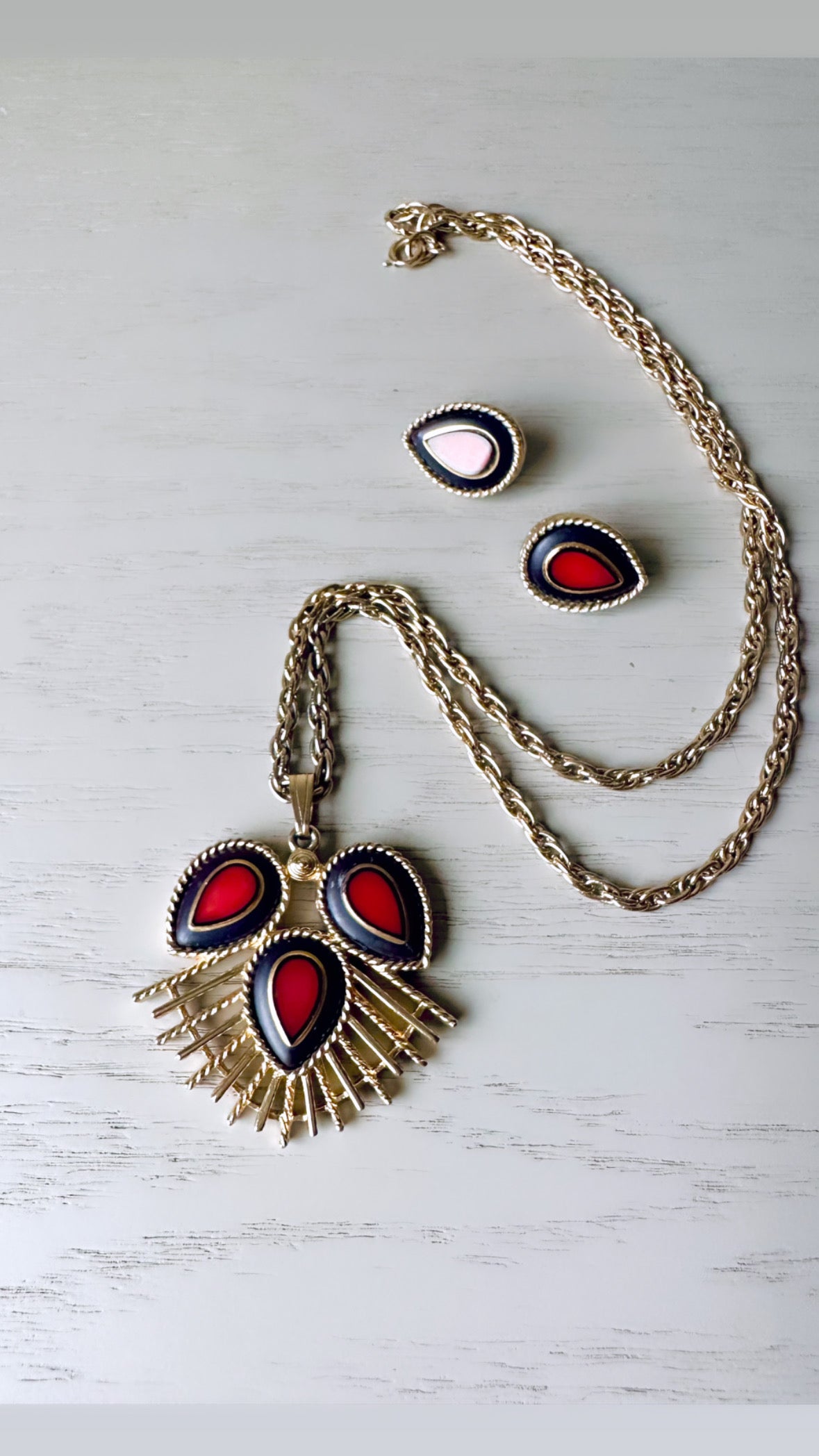 Close up of Red, Black and gold 1973 SC Dynasty Necklace and Matching Earring Set